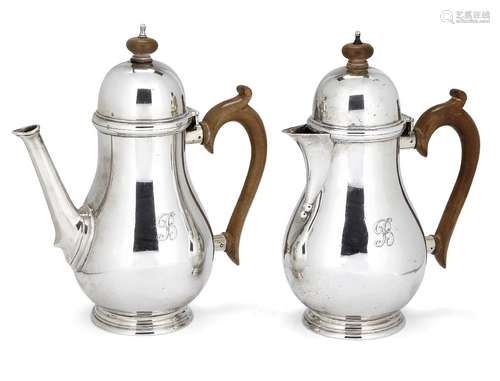 A pair of café-au-lait pots, London, c.1936, Blackmore & Fletcher Ltd, of bulbous form with hinged