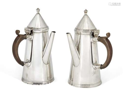 A pair of side-handled silver café-au-lait pots, Sheffield, c.1922, Thomas Bradbury & Sons Ltd, of