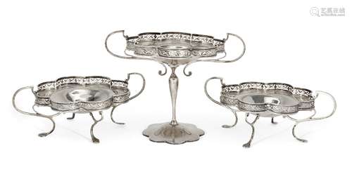 A set of three silver compotes, Birmingham, c.1921, G&C&Co, each designed with bifurcated twin