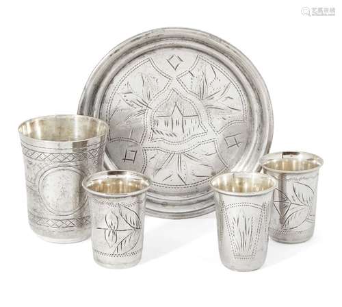 A small collection of Russian silver, comprising: three small silver shot cups, one Kiev, 1908-1926,