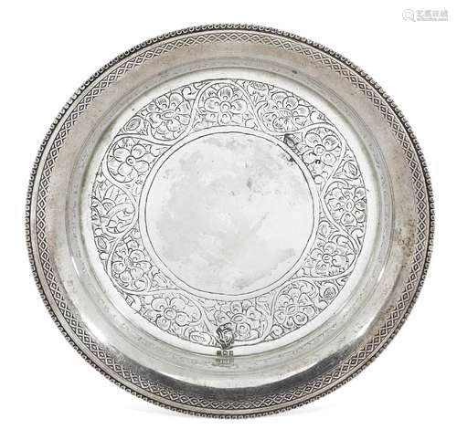 An Egyptian silver goblet stand, c.1932, of circular form with beaded edge to flat base decorated