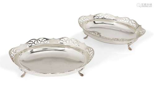 A pair of silver dishes with pierced galleries, Birmingham, c.1933, JPH, of shaped, oval form,