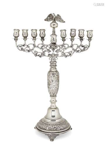 A large silver menorah by Joseph Zweig, London c.1917, in the Polish manner, the baluster column