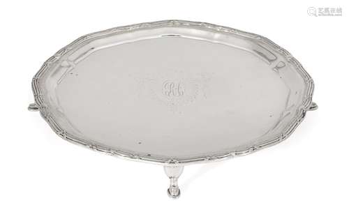 A silver card tray, Chester, c.1919, Barker Brothers, of rounded form and raised on four hoof