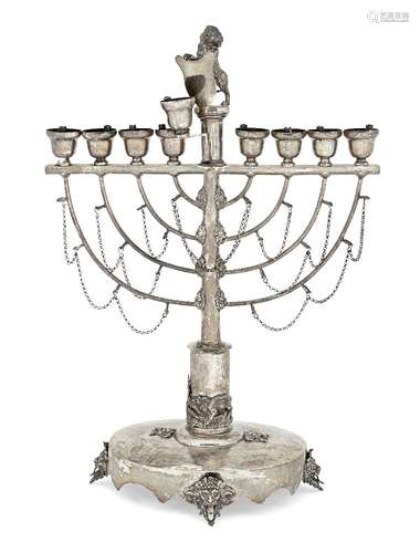 A large Austro-Hungarian menorah, mid 19th century, stamped only with 13 standard mark, designed