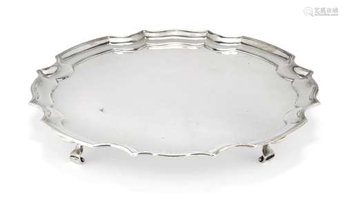 A silver salver with Chippendale-style edge, Sheffield, c.1922, James Dixon & Sons., of circular