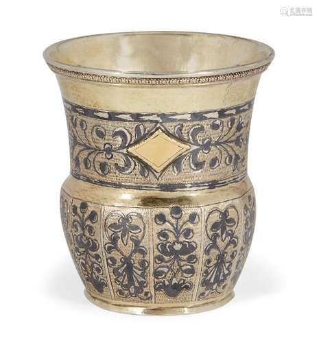 A Russian silver niello liqueur cup, Moscow, assay master and date marks rubbed, maker EE, the