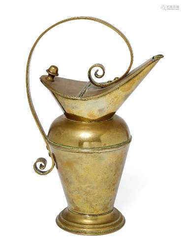 Attributed to Christopher Dresser (1834-1904), a Benham & Froud brass jug Design registered 1885,