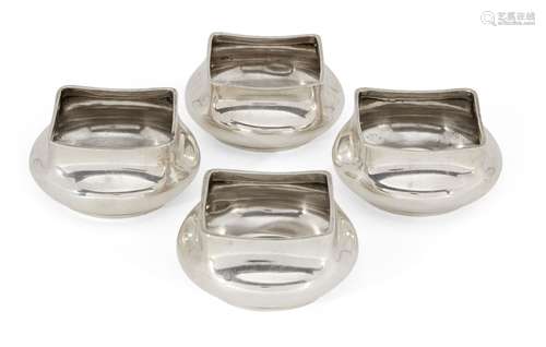 A set of four silver salts, each stamped sterling, designed with square rims to rounded bodies,