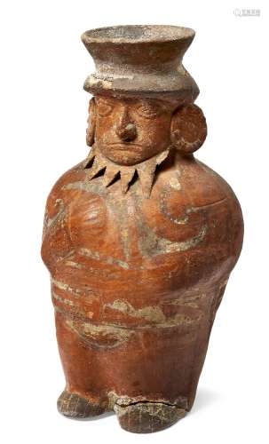 A Pre Columbian Moche Pot, 7th/8th century, modelled as a stylised standing man, 40cm highPlease