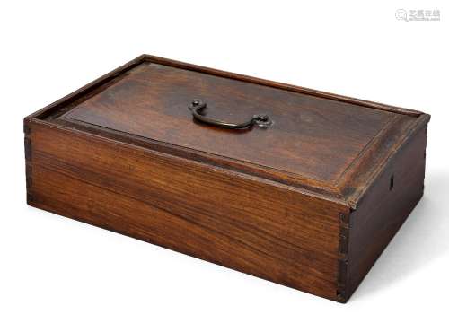 A Chinese padouk wood rectangular box, late 19th century, with brass carry handle and sliding cover,