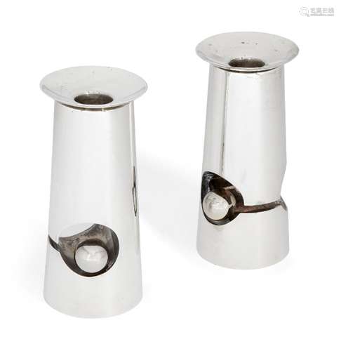 A pair of contemporary Israeli short Sabbath candlesticks, stamped 925, the cut-out fronts featuring