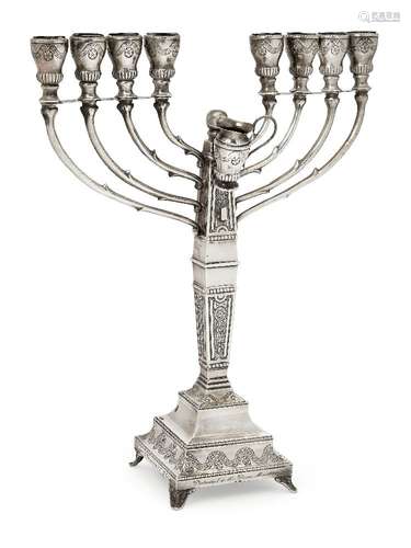 An interesting silver menorah formerly presented to Margaret Thatcher, stamped '925 sterling', the