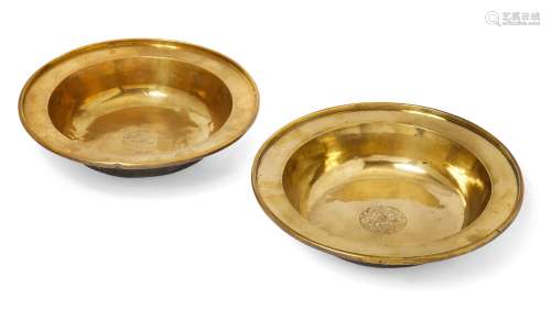 A pair of Chinese brass bowls, 19th century, engraved with a lotus medallion, 33cm diameter (2)
