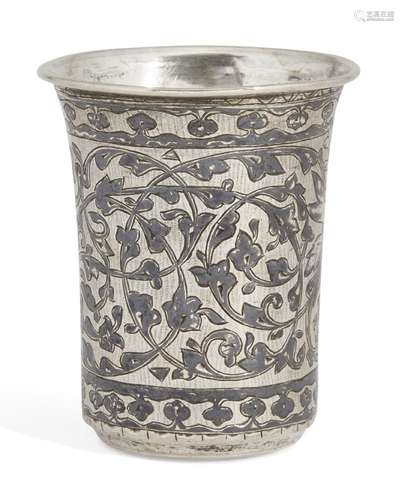 A white metal niello decorated beaker, spurious marks, decorated with foliate patterns and a scene