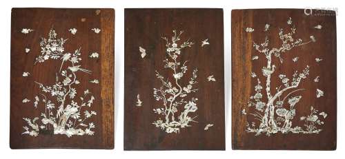 Three Chinese padouk wood and mother of pearl inlaid panels, late 19th century, each decorated