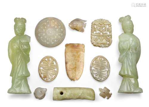 Eleven Chinese jade and green hardstone carvings, 18th - early 20th century, comprising an archaic