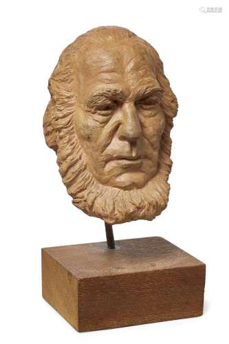 A terracotta bust of Alexandr Solzhenitsyn, 1970s, on hardwood base with typed paper label Exhibited