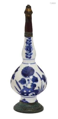 A Chinese porcelain rosewater sprinkler, Kangxi period, painted in underglaze blue with peony and