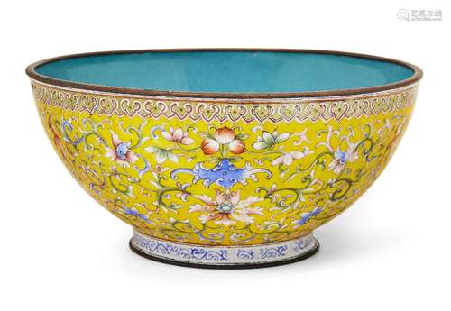 A Chinese Canton enamel yellow ground bowl, Republic period, painted to the exterior with bats