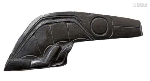 A Pacific North West Haida argillite pipe fragment, late 19th century, incised with a stylised