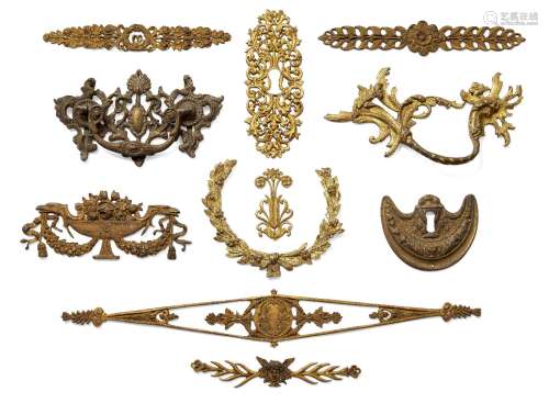 A large collection of ormolu and gilt-bronze furniture mounts, 18th and 19th century, including