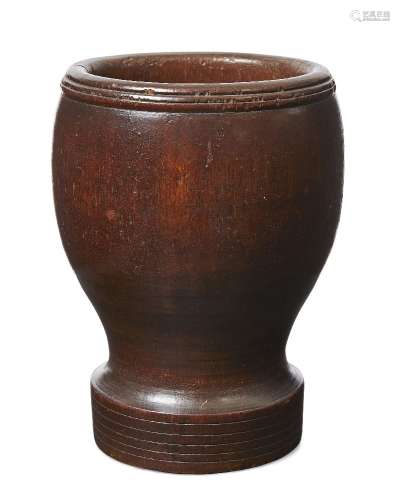 An American turned treen mortar, 19th century, with moulded rim, the foot with five incised lines,