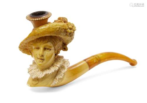A meerschaum pipe, late 19th century, in the form of a lady with a floral hat and lace collar,