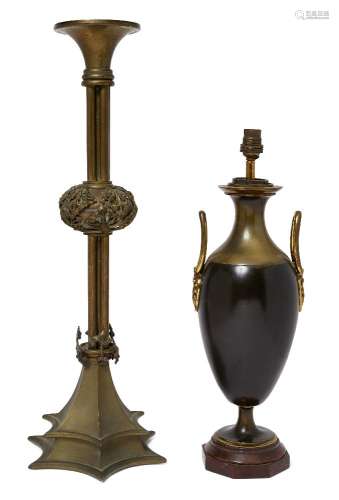 A French gilt and patinated bronze lamp, late 19th century, the ovoid body with loop handles and