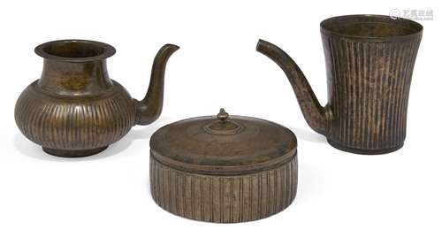 Three bronze vessels, Deccan, India, 18th century, comprising a circular lidded pandan box, and