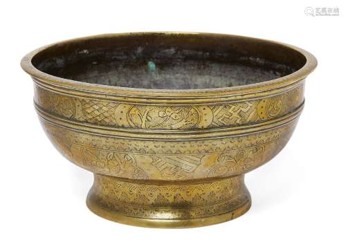 A brass bowl, possibly Dutch East Indies, early 19th century, elaborately engraved overall, 13cm