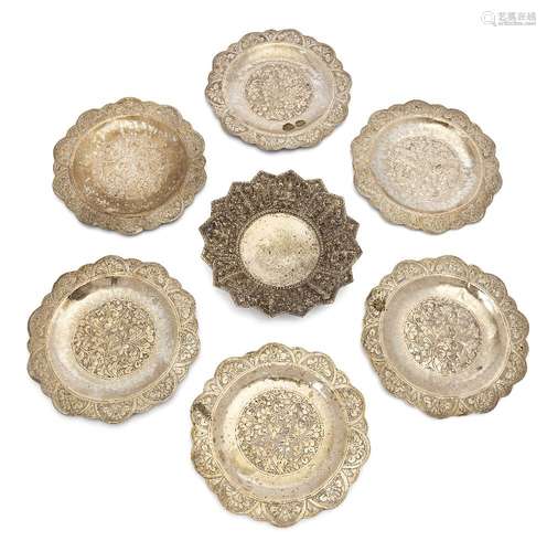 A group of six hammered silver sweet dishes, Malaysia, 20th century, with lobed edges and design