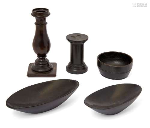 A treen candlestick, c.1800, of baluster form, 17cm high, together with a small ebonised bowl,