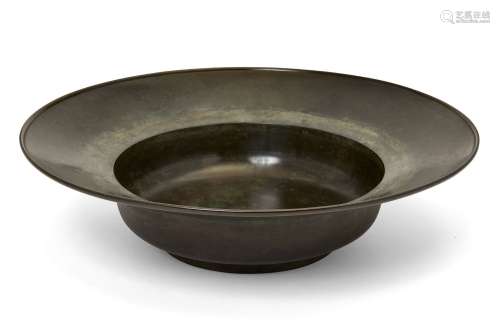 A large bronze bowl, 18th/19th century, of shallow form, 40cm diameter,Please refer to department