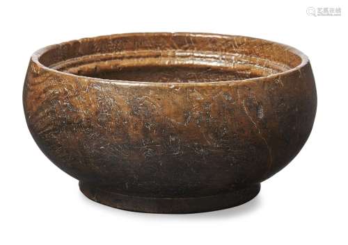 An English burr treen dairy bowl, 19th century, with inverted moulded rim, 10.5cm high, 22cm