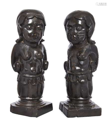 A pair of Indo Portuguese ebony mermaid finials, Goa, late 17th century, each on square-section
