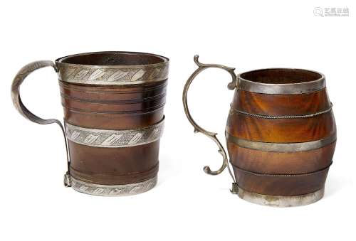 Two turned wood white metal mounted mugs, 18th/19th century, one of barrel form with 's' scroll