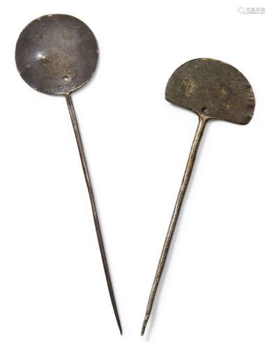 Two South American silver tupu, 17th century, one with disc terminal the other with demi disc