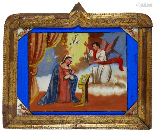 A Spanish colonial reverse glass painting of the Annunciation, 19th century, with blue border, in