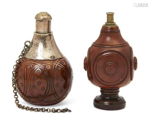 Two coquilla nut snuff flasks, late 18th/early 19th century, one with white metal mount and stopper,