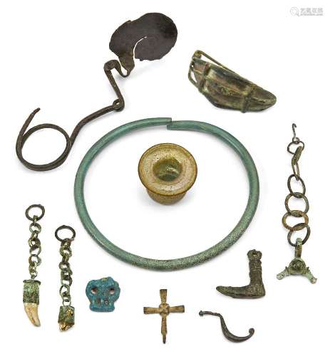 A miscellaneous group of objects, including a Bronze Age bronze torc, circa 1800 - 1400 B.C, 12.