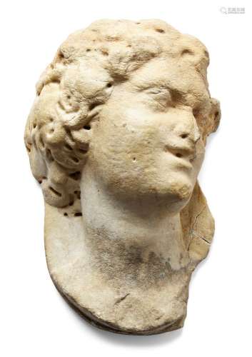 A carved marble relief of a Classical head, 16th century, gaze to dexter, 33cm high, 20cm wide, 14cm