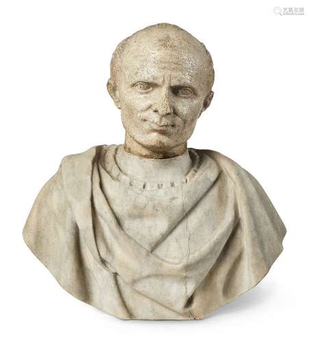 An Italian marble bust of Caesar, in the antique style, on an associated marble torso with draped