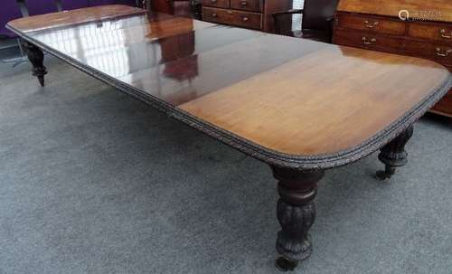 A Victorian mahogany double end extending dining table,