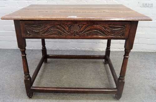 A 17th century oak plank top side table,