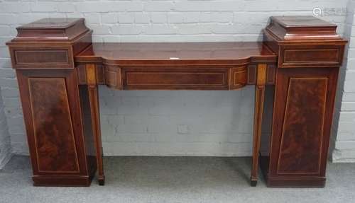 A George III inlaid mahogany sideboard, with central bow single drawer, flanked by pedestals,