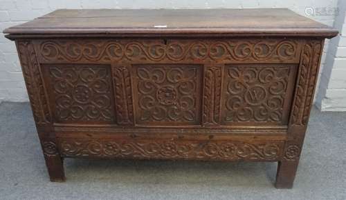 A 17th century and later oak mule chest with single drawer base on stile feet,