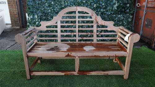 A Lutyens design teak framed hardwood garden bench, 165cm wide x 104cm high.