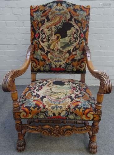 A Louis XIV style beech framed high back open armchair, on paw feet, 66cm wide x 118cm high.