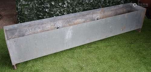 A pair of modern rectangular galvanised garden planters, each 250cm wide x 52cm high, (2).